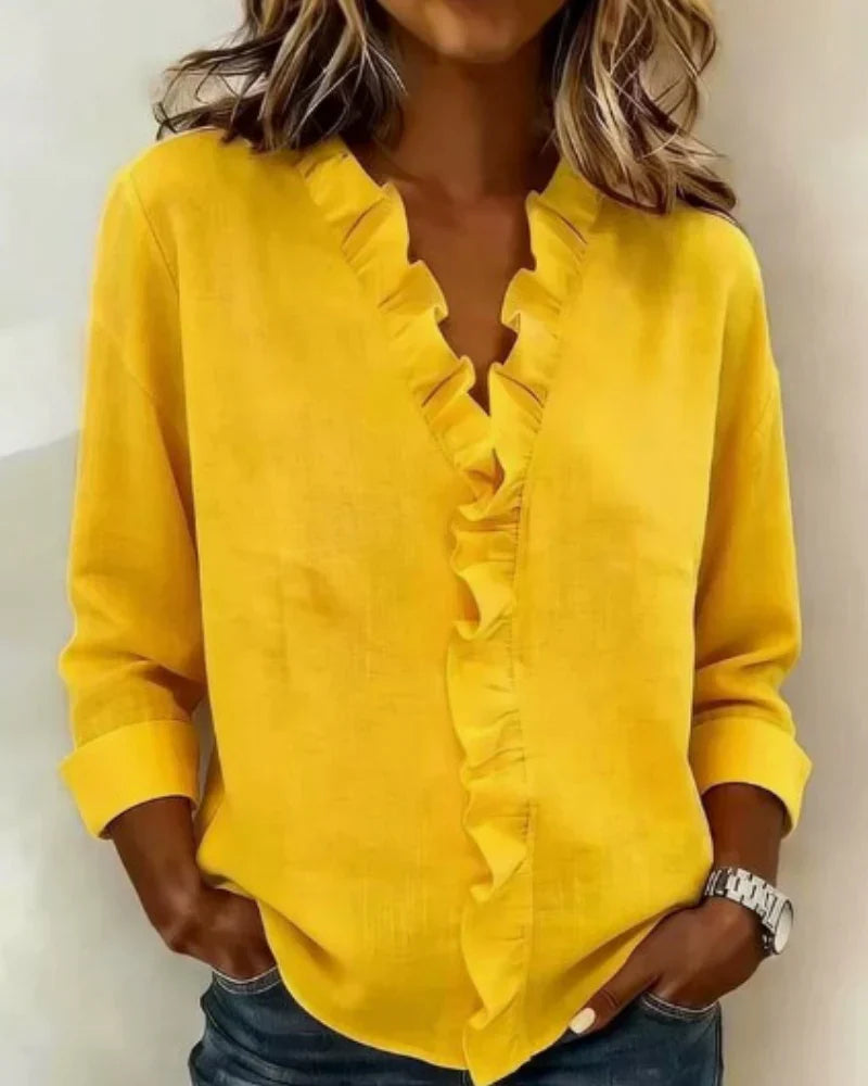 Irene | Blusa elegante con volantes, escote en V y mangas largas